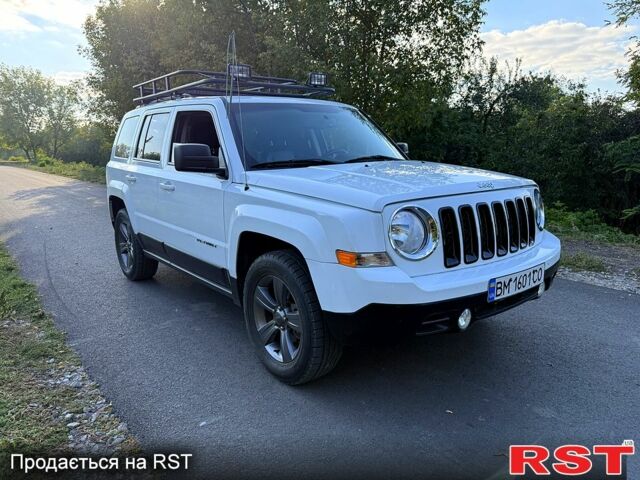 Білий Джип Patriot, об'ємом двигуна 2.4 л та пробігом 82 тис. км за 11200 $, фото 2 на Automoto.ua