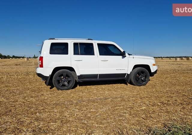 Белый Джип Патриот, объемом двигателя 2.4 л и пробегом 112 тыс. км за 11500 $, фото 12 на Automoto.ua