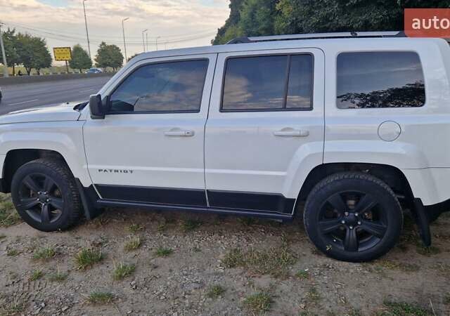 Белый Джип Патриот, объемом двигателя 2.4 л и пробегом 112 тыс. км за 11500 $, фото 4 на Automoto.ua