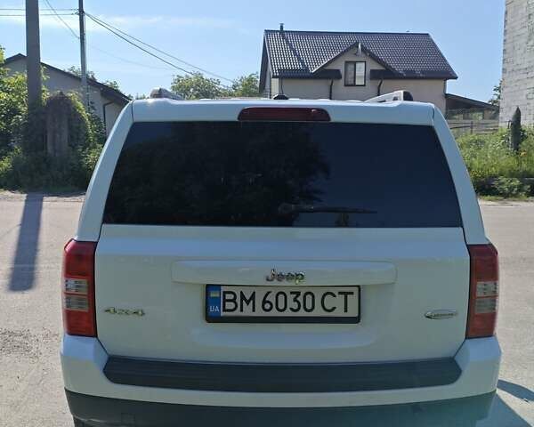 Белый Джип Патриот, объемом двигателя 2.4 л и пробегом 169 тыс. км за 12000 $, фото 3 на Automoto.ua