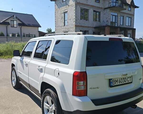 Белый Джип Патриот, объемом двигателя 2.4 л и пробегом 169 тыс. км за 12000 $, фото 4 на Automoto.ua