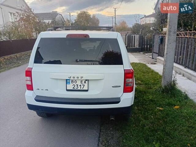 Белый Джип Патриот, объемом двигателя 2.36 л и пробегом 160 тыс. км за 8800 $, фото 4 на Automoto.ua