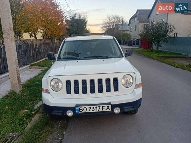 Белый Джип Патриот, объемом двигателя 2.36 л и пробегом 160 тыс. км за 8800 $, фото 3 на Automoto.ua