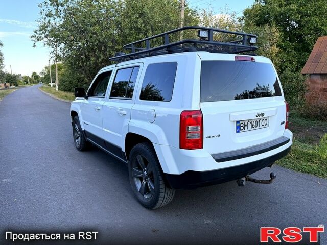 Білий Джип Patriot, об'ємом двигуна 2.4 л та пробігом 82 тис. км за 11200 $, фото 5 на Automoto.ua