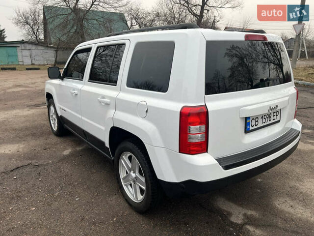 Белый Джип Патриот, объемом двигателя 2 л и пробегом 210 тыс. км за 8500 $, фото 6 на Automoto.ua