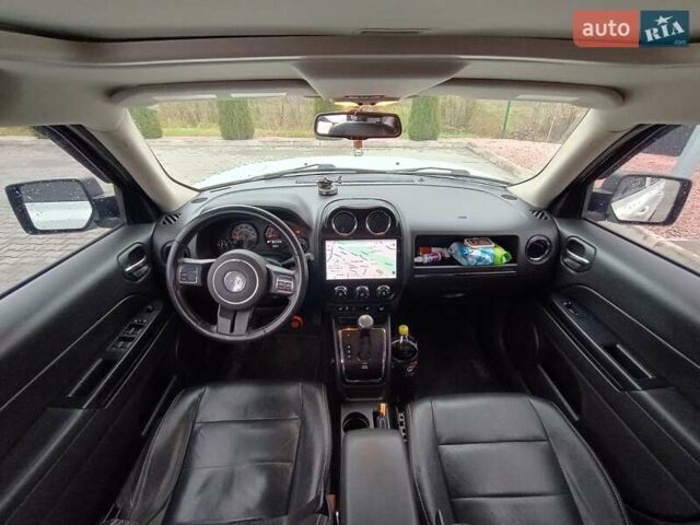 Білий Джип Patriot, об'ємом двигуна 2.36 л та пробігом 80 тис. км за 12700 $, фото 14 на Automoto.ua