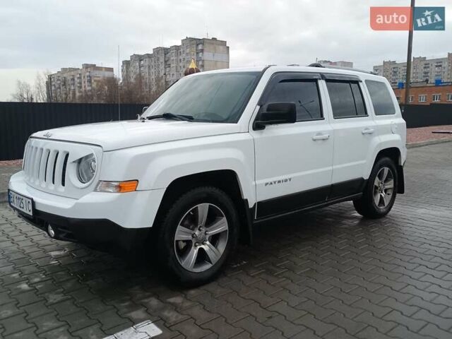 Білий Джип Patriot, об'ємом двигуна 2.36 л та пробігом 80 тис. км за 12700 $, фото 8 на Automoto.ua