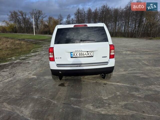 Белый Джип Патриот, объемом двигателя 2.36 л и пробегом 104 тыс. км за 11500 $, фото 4 на Automoto.ua