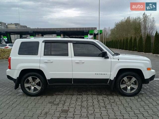 Білий Джип Patriot, об'ємом двигуна 2.36 л та пробігом 80 тис. км за 12700 $, фото 11 на Automoto.ua