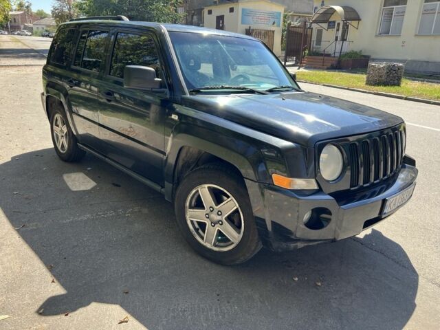Черный Джип Патриот, объемом двигателя 2.4 л и пробегом 250 тыс. км за 5900 $, фото 1 на Automoto.ua