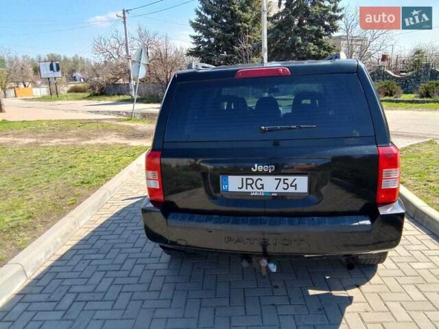 Чорний Джип Patriot, об'ємом двигуна 2 л та пробігом 285 тис. км за 4800 $, фото 4 на Automoto.ua