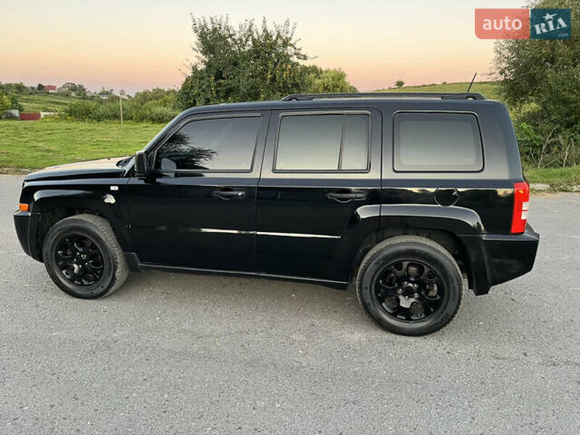 Черный Джип Патриот, объемом двигателя 2.36 л и пробегом 251 тыс. км за 6250 $, фото 5 на Automoto.ua