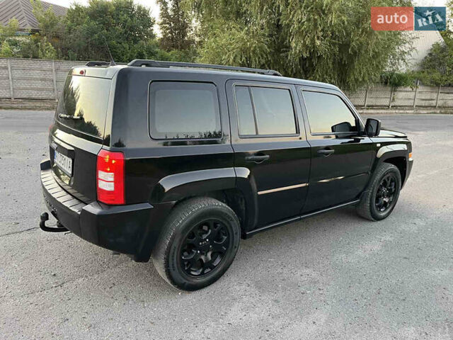 Черный Джип Патриот, объемом двигателя 2.36 л и пробегом 251 тыс. км за 6250 $, фото 10 на Automoto.ua