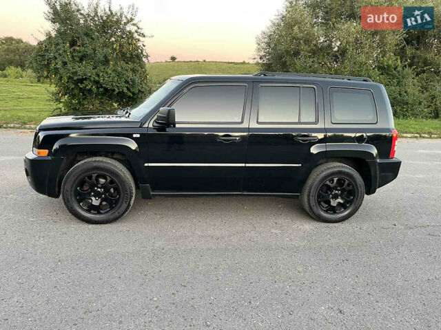 Черный Джип Патриот, объемом двигателя 2.36 л и пробегом 251 тыс. км за 6350 $, фото 4 на Automoto.ua