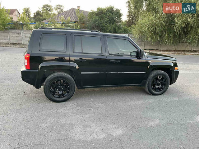 Черный Джип Патриот, объемом двигателя 2.36 л и пробегом 251 тыс. км за 6350 $, фото 11 на Automoto.ua