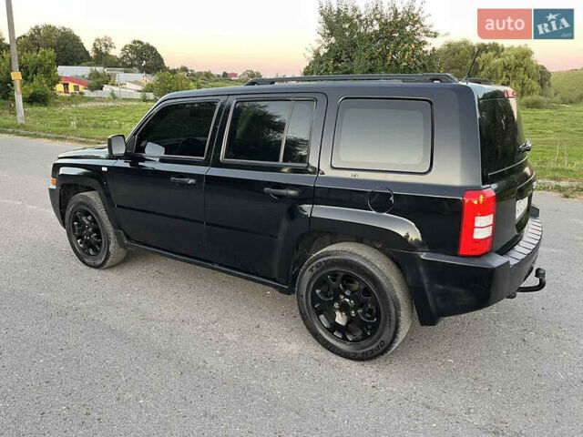 Черный Джип Патриот, объемом двигателя 2.36 л и пробегом 251 тыс. км за 6250 $, фото 6 на Automoto.ua