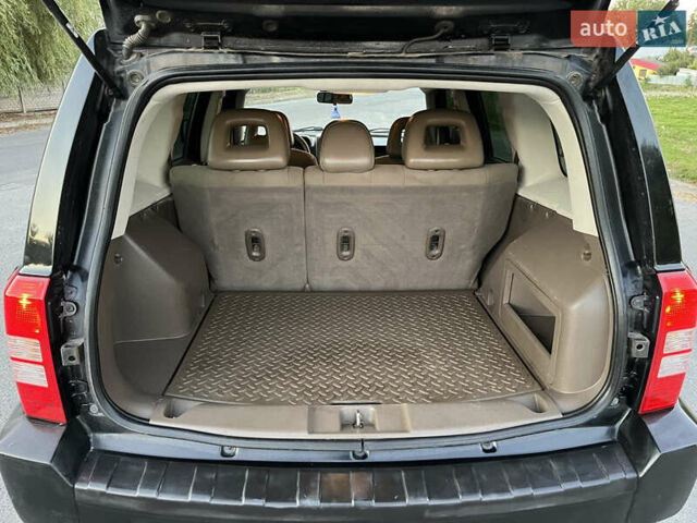 Черный Джип Патриот, объемом двигателя 2.36 л и пробегом 251 тыс. км за 6350 $, фото 19 на Automoto.ua