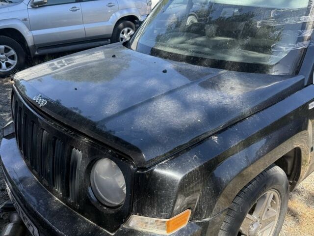 Черный Джип Патриот, объемом двигателя 2 л и пробегом 200 тыс. км за 3000 $, фото 1 на Automoto.ua