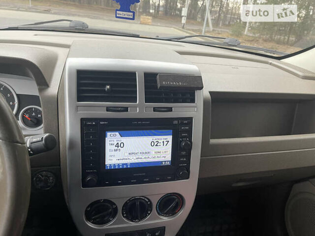 Черный Джип Патриот, объемом двигателя 2 л и пробегом 269 тыс. км за 8300 $, фото 12 на Automoto.ua