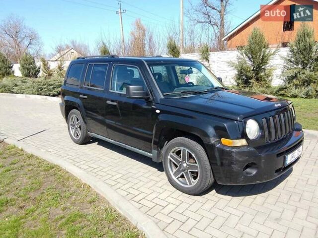 Чорний Джип Patriot, об'ємом двигуна 2 л та пробігом 285 тис. км за 4800 $, фото 1 на Automoto.ua