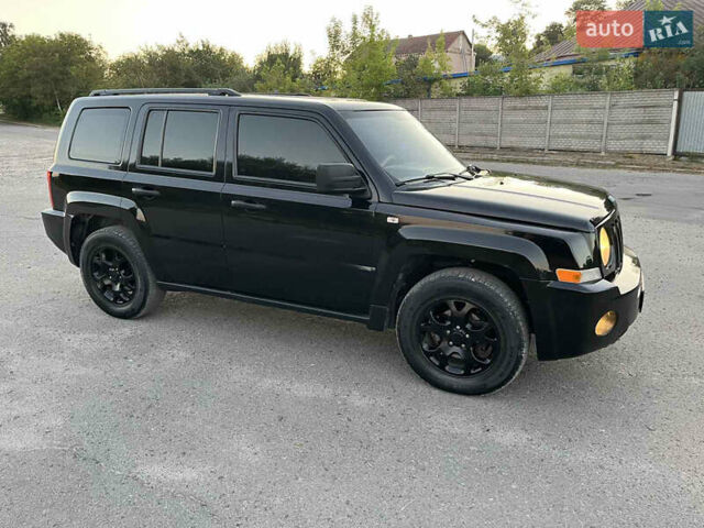 Черный Джип Патриот, объемом двигателя 2.36 л и пробегом 251 тыс. км за 6250 $, фото 13 на Automoto.ua