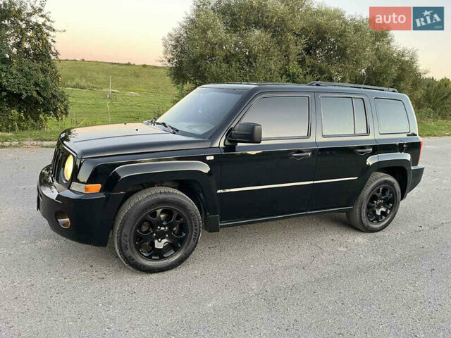Черный Джип Патриот, объемом двигателя 2.36 л и пробегом 251 тыс. км за 6350 $, фото 3 на Automoto.ua