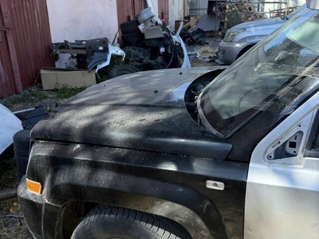 Черный Джип Патриот, объемом двигателя 2 л и пробегом 200 тыс. км за 3000 $, фото 4 на Automoto.ua