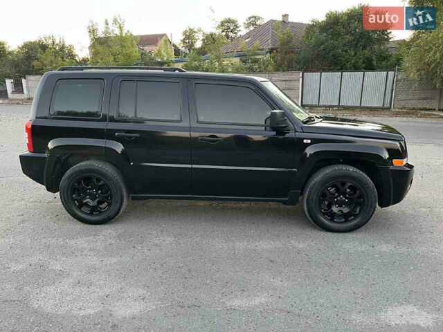 Черный Джип Патриот, объемом двигателя 2.36 л и пробегом 251 тыс. км за 6350 $, фото 12 на Automoto.ua
