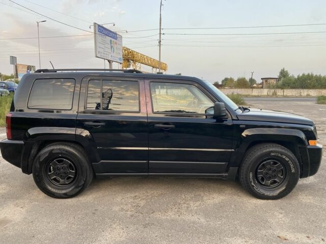 Чорний Джип Patriot, об'ємом двигуна 2.4 л та пробігом 245 тис. км за 6800 $, фото 23 на Automoto.ua