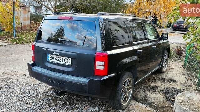 Черный Джип Патриот, объемом двигателя 2.36 л и пробегом 280 тыс. км за 4500 $, фото 29 на Automoto.ua