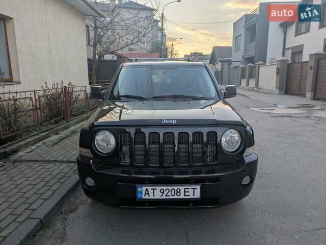 Чорний Джип Patriot, об'ємом двигуна 2.36 л та пробігом 267 тис. км за 7500 $, фото 1 на Automoto.ua