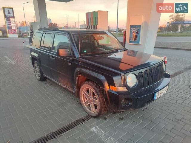 Черный Джип Патриот, объемом двигателя 2.36 л и пробегом 280 тыс. км за 4500 $, фото 3 на Automoto.ua
