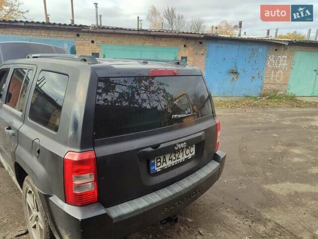 Черный Джип Патриот, объемом двигателя 2.36 л и пробегом 280 тыс. км за 4500 $, фото 15 на Automoto.ua