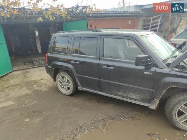 Черный Джип Патриот, объемом двигателя 2.36 л и пробегом 280 тыс. км за 4500 $, фото 9 на Automoto.ua