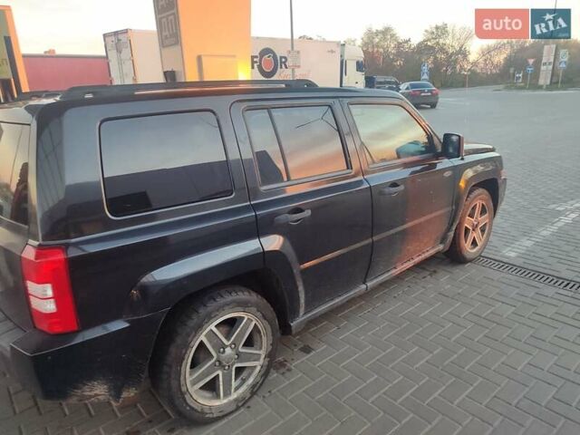 Черный Джип Патриот, объемом двигателя 2.36 л и пробегом 280 тыс. км за 4500 $, фото 4 на Automoto.ua