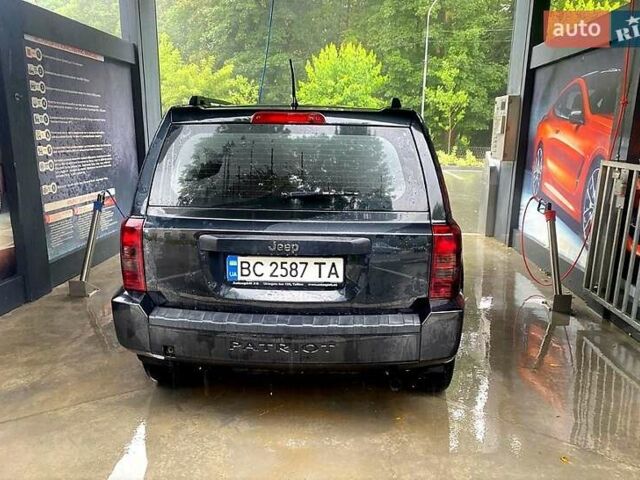 Черный Джип Патриот, объемом двигателя 2 л и пробегом 195 тыс. км за 5250 $, фото 1 на Automoto.ua