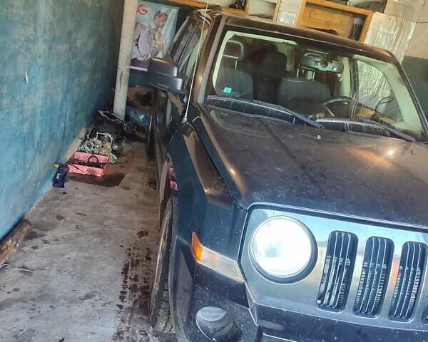 Черный Джип Патриот, объемом двигателя 2.36 л и пробегом 280 тыс. км за 4500 $, фото 8 на Automoto.ua