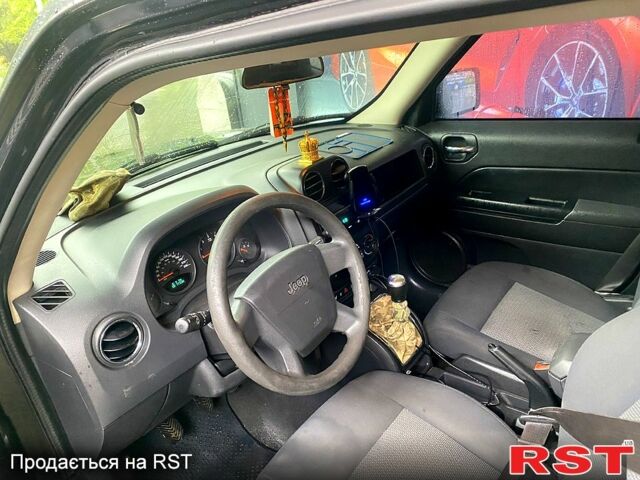 Черный Джип Патриот, объемом двигателя 2 л и пробегом 195 тыс. км за 5250 $, фото 4 на Automoto.ua