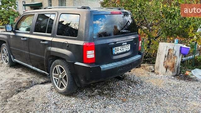 Черный Джип Патриот, объемом двигателя 2.36 л и пробегом 280 тыс. км за 4500 $, фото 27 на Automoto.ua