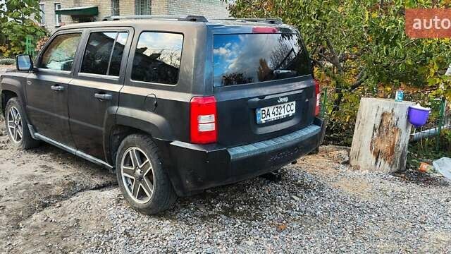 Черный Джип Патриот, объемом двигателя 2.36 л и пробегом 280 тыс. км за 4500 $, фото 22 на Automoto.ua