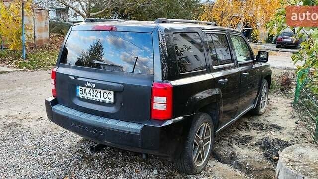 Черный Джип Патриот, объемом двигателя 2.36 л и пробегом 280 тыс. км за 4500 $, фото 20 на Automoto.ua