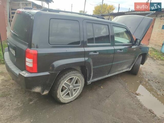 Черный Джип Патриот, объемом двигателя 2.36 л и пробегом 280 тыс. км за 4500 $, фото 5 на Automoto.ua