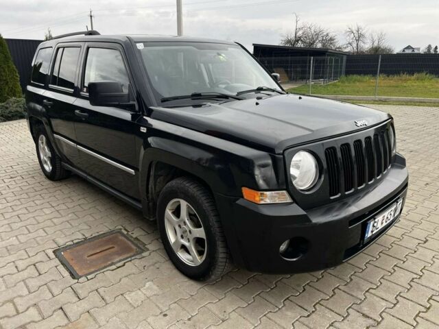 Черный Джип Патриот, объемом двигателя 2.2 л и пробегом 250 тыс. км за 3100 $, фото 1 на Automoto.ua