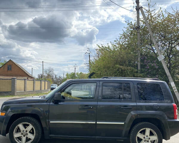 Черный Джип Патриот, объемом двигателя 2.36 л и пробегом 188 тыс. км за 6000 $, фото 1 на Automoto.ua