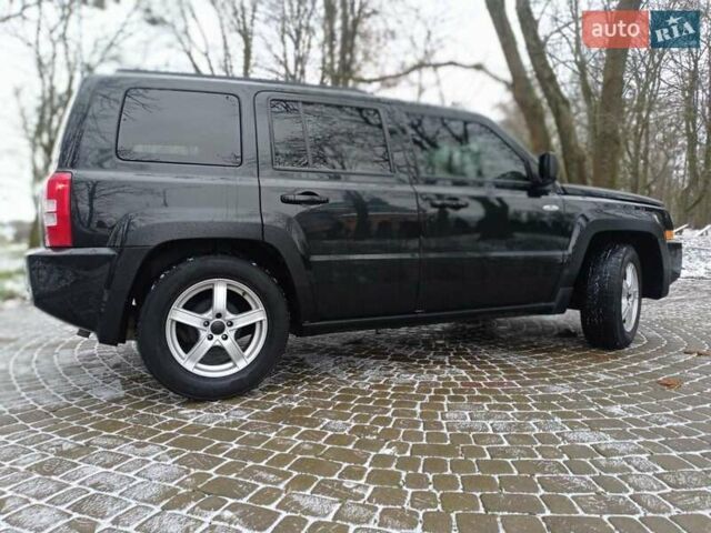 Чорний Джип Patriot, об'ємом двигуна 2.4 л та пробігом 120 тис. км за 8300 $, фото 5 на Automoto.ua