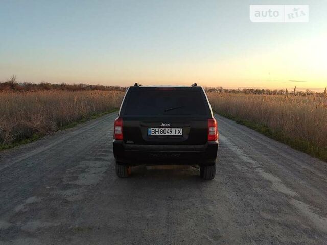 Чорний Джип Patriot, об'ємом двигуна 2 л та пробігом 198 тис. км за 8500 $, фото 66 на Automoto.ua