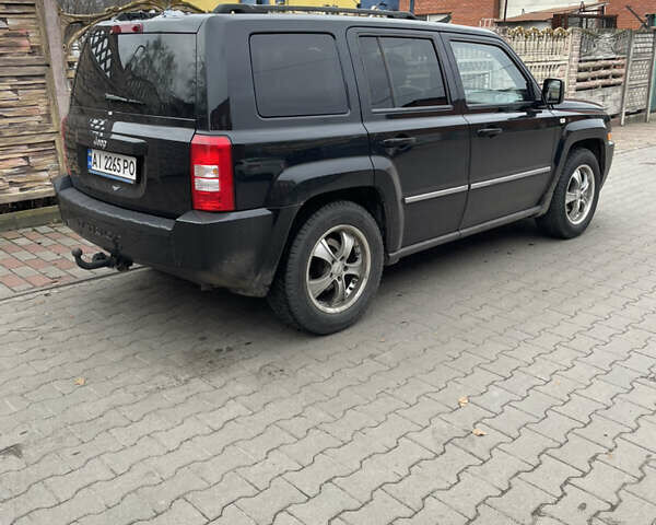 Чорний Джип Patriot, об'ємом двигуна 2.4 л та пробігом 225 тис. км за 9300 $, фото 3 на Automoto.ua