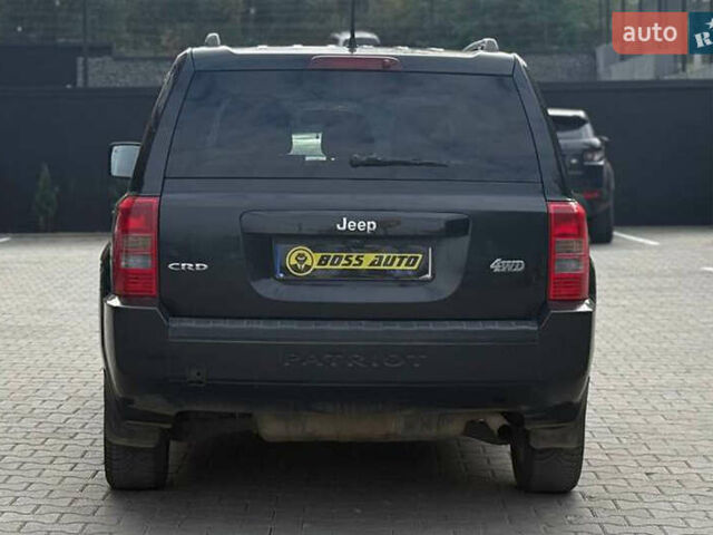 Черный Джип Патриот, объемом двигателя 2.14 л и пробегом 226 тыс. км за 11000 $, фото 4 на Automoto.ua