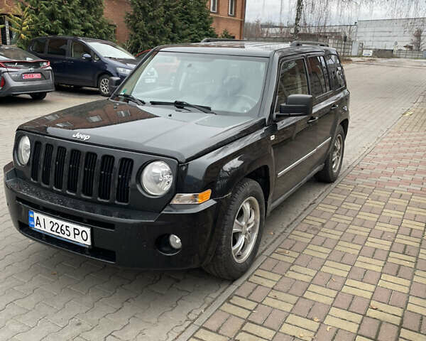 Чорний Джип Patriot, об'ємом двигуна 2.4 л та пробігом 225 тис. км за 9300 $, фото 2 на Automoto.ua
