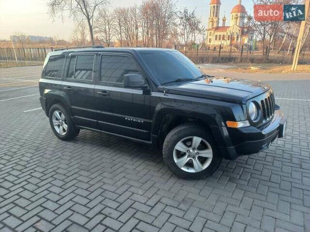 Чорний Джип Patriot, об'ємом двигуна 2.36 л та пробігом 175 тис. км за 9000 $, фото 9 на Automoto.ua